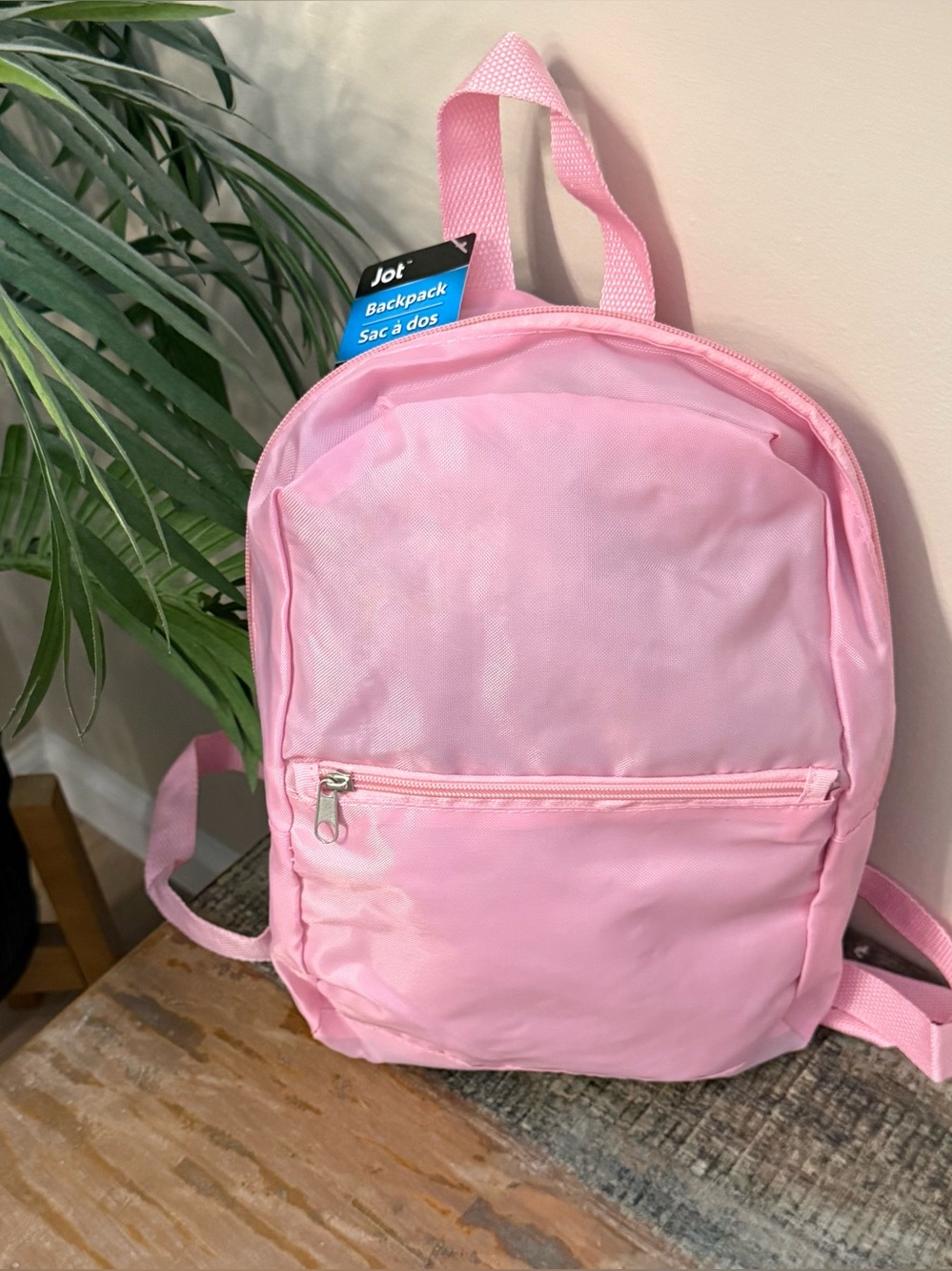 New Light pink small nylon backpack. Adjustable straps.
